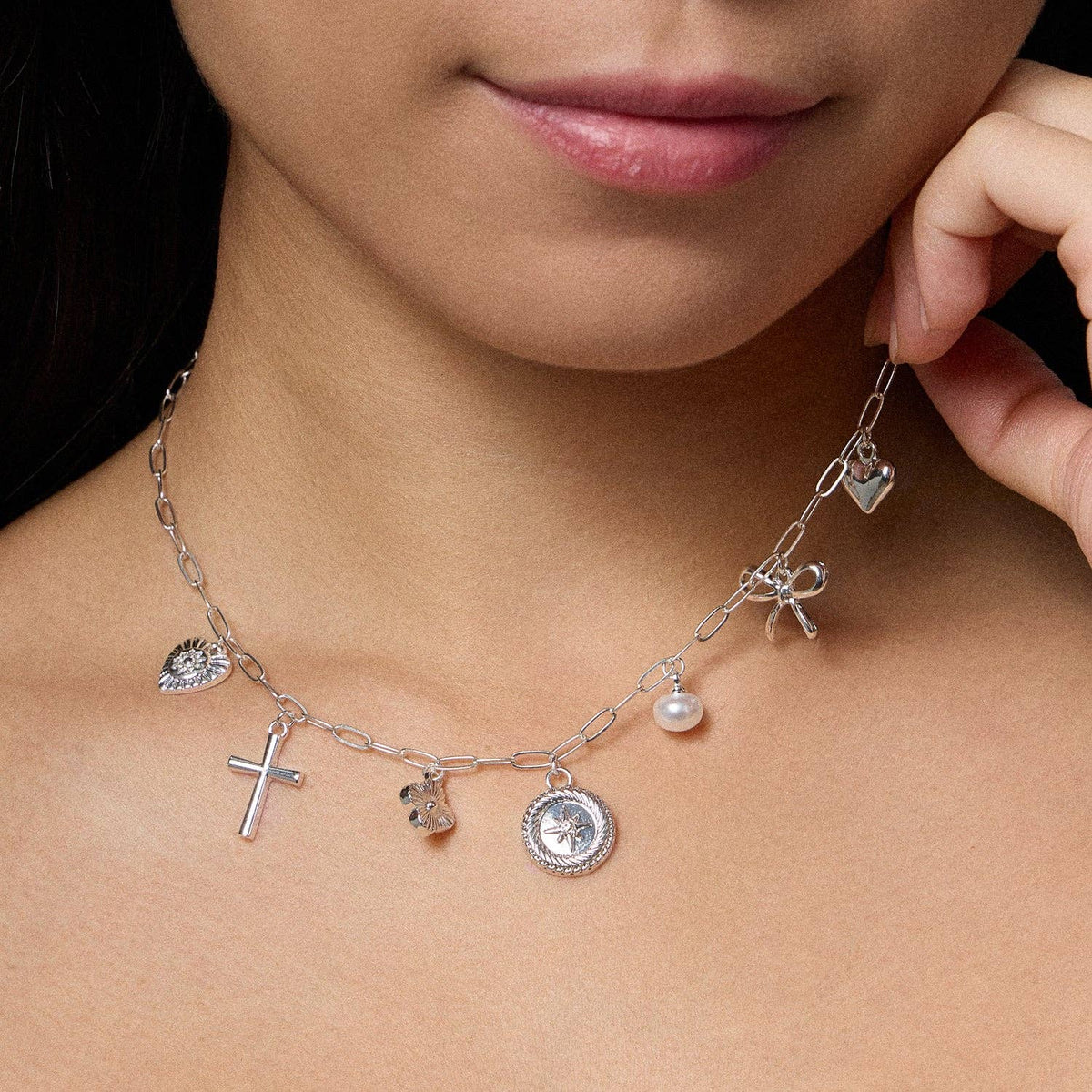 Charm Necklace with Heart, Cross, Compass Pearl, and Bow Pendants